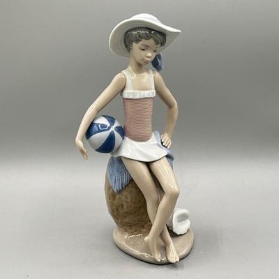 LOT 55L: Lladro Summer Figurine - Beach Girl with Ball