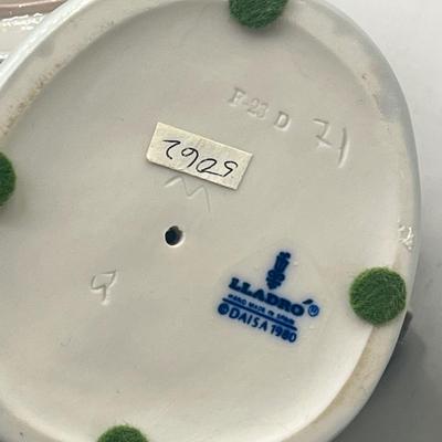 LOT 56L: Dutch Girl with Braids Lladro Figurine