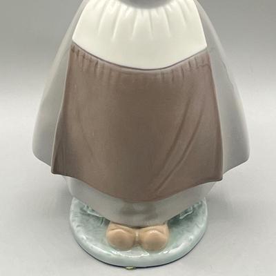 LOT 56L: Dutch Girl with Braids Lladro Figurine