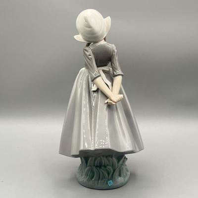 LOT 56L: Dutch Girl with Braids Lladro Figurine