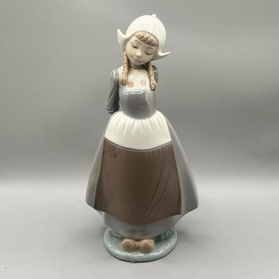 LOT 56L: Dutch Girl with Braids Lladro Figurine