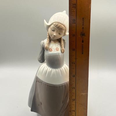 LOT 56L: Dutch Girl with Braids Lladro Figurine