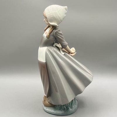 LOT 56L: Dutch Girl with Braids Lladro Figurine