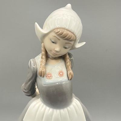 LOT 56L: Dutch Girl with Braids Lladro Figurine