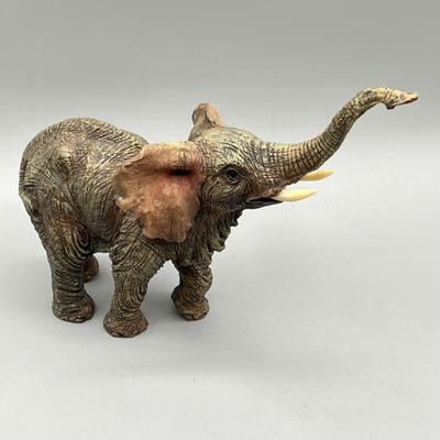 LOT 62L: Stone Floral Arrangement and Assorted Animal Figurines