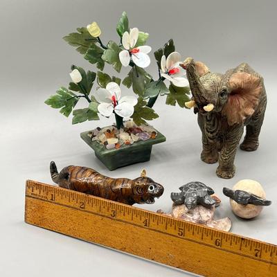 LOT 62L: Stone Floral Arrangement and Assorted Animal Figurines