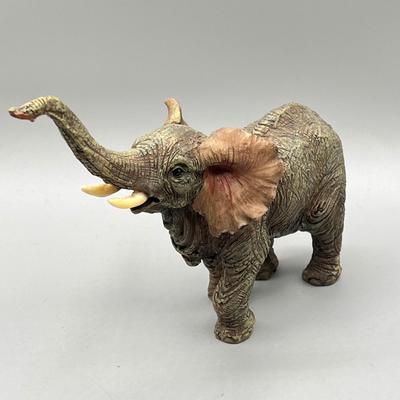 LOT 62L: Stone Floral Arrangement and Assorted Animal Figurines