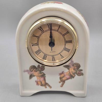 LOT 90L: Liette International Clock and Trinket Box, Coyne's & Company Heavenly Angels Figurine, Enesco Foundations Hail Mary...