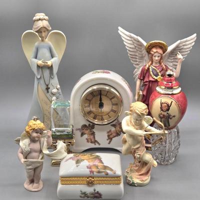 LOT 90L: Liette International Clock and Trinket Box, Coyne's & Company Heavenly Angels Figurine, Enesco Foundations Hail Mary...