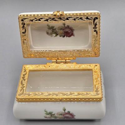 LOT 90L: Liette International Clock and Trinket Box, Coyne's & Company Heavenly Angels Figurine, Enesco Foundations Hail Mary...