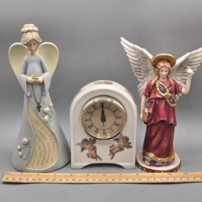LOT 90L: Liette International Clock and Trinket Box, Coyne's & Company Heavenly Angels Figurine, Enesco Foundations Hail Mary...