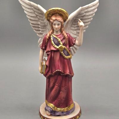 LOT 90L: Liette International Clock and Trinket Box, Coyne's & Company Heavenly Angels Figurine, Enesco Foundations Hail Mary...