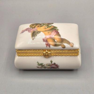 LOT 90L: Liette International Clock and Trinket Box, Coyne's & Company Heavenly Angels Figurine, Enesco Foundations Hail Mary...