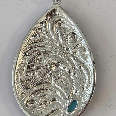 Silver Tone Teardrop Necklace With Ornate Scrollwork and Turquoise Color Accent