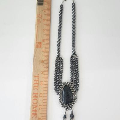 Dark Gray Multi Strand Beaded Necklace With Black Crackle Stone Pendant and Feather Drops