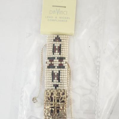 Da Vinci White Beaded Bracelet With Geometric Pattern and Gold Tone Openwork Clasp Adjustable