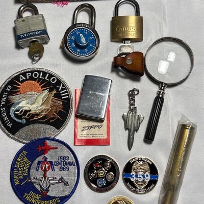 Commemorative Jason Moszer coins and patches, lighter, bullet, and more