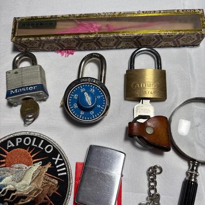 Commemorative Jason Moszer coins and patches, lighter, bullet, and more