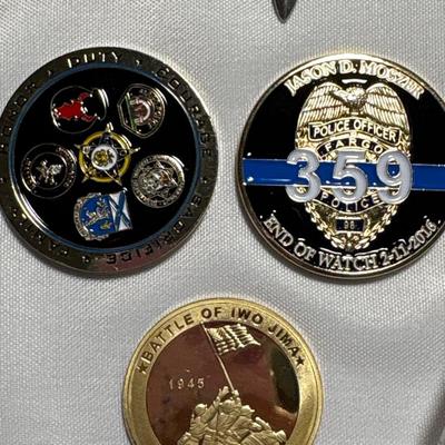 Commemorative Jason Moszer coins and patches, lighter, bullet, and more