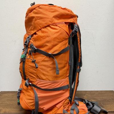 Sale Photo Thumbnail #215: Near-new condition, single large internal space that is surrounded by many compression straps to minimize bag size when not completely full.  Numerous outer pockets and tie down loops at the top and bottom for securing extra gear like sleeping bags and fo
