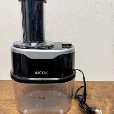 Sale Photo Thumbnail #210: Electric vegetable slicer. Comes with 2 slicing inserts.  Tested, runs smoothly and quietly. Near new condition.