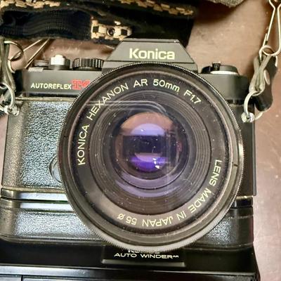 Sale Photo Thumbnail #616: From the late 70’s, includes custom fabric nick strap, matched Konica Autowinder, Konica 50mm lens with Asanuma 55mm Skylight 1A filter, Soligor 35-105mm zoom lens with Macro, Hoya 72mm Skylight 1B filter and case, extra filter and adapter ring, auto re