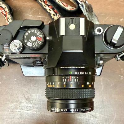 Sale Photo Thumbnail #617: From the late 70’s, includes custom fabric nick strap, matched Konica Autowinder, Konica 50mm lens with Asanuma 55mm Skylight 1A filter, Soligor 35-105mm zoom lens with Macro, Hoya 72mm Skylight 1B filter and case, extra filter and adapter ring, auto re