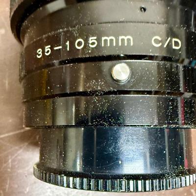 Sale Photo Thumbnail #612: From the late 70’s, includes custom fabric nick strap, matched Konica Autowinder, Konica 50mm lens with Asanuma 55mm Skylight 1A filter, Soligor 35-105mm zoom lens with Macro, Hoya 72mm Skylight 1B filter and case, extra filter and adapter ring, auto re