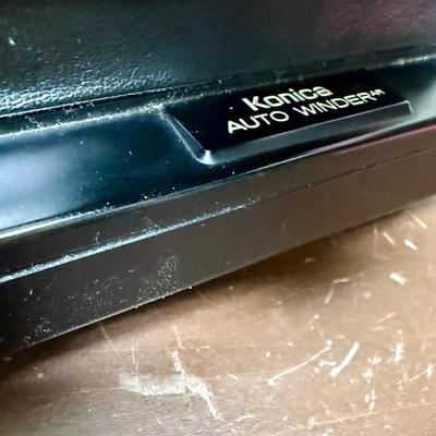 Sale Photo Thumbnail #618: From the late 70’s, includes custom fabric nick strap, matched Konica Autowinder, Konica 50mm lens with Asanuma 55mm Skylight 1A filter, Soligor 35-105mm zoom lens with Macro, Hoya 72mm Skylight 1B filter and case, extra filter and adapter ring, auto re