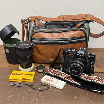 Sale Photo Thumbnail #605: From the late 70’s, includes custom fabric nick strap, matched Konica Autowinder, Konica 50mm lens with Asanuma 55mm Skylight 1A filter, Soligor 35-105mm zoom lens with Macro, Hoya 72mm Skylight 1B filter and case, extra filter and adapter ring, auto re