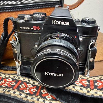 Sale Photo Thumbnail #606: From the late 70’s, includes custom fabric nick strap, matched Konica Autowinder, Konica 50mm lens with Asanuma 55mm Skylight 1A filter, Soligor 35-105mm zoom lens with Macro, Hoya 72mm Skylight 1B filter and case, extra filter and adapter ring, auto re