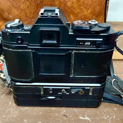 Sale Photo Thumbnail #619: From the late 70’s, includes custom fabric nick strap, matched Konica Autowinder, Konica 50mm lens with Asanuma 55mm Skylight 1A filter, Soligor 35-105mm zoom lens with Macro, Hoya 72mm Skylight 1B filter and case, extra filter and adapter ring, auto re