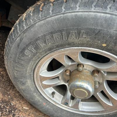 Sale Photo Thumbnail #8: Has some dings. Great condition. Upgraded to 7,500 axels. Tie down spots.