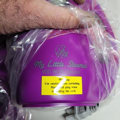 Sale Photo Thumbnail #284: Everyone needs a purple steam iron, your chance to be wrinkle free