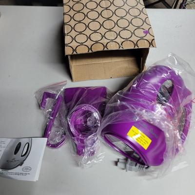 Sale Photo Thumbnail #283: Everyone needs a purple steam iron, your chance to be wrinkle free