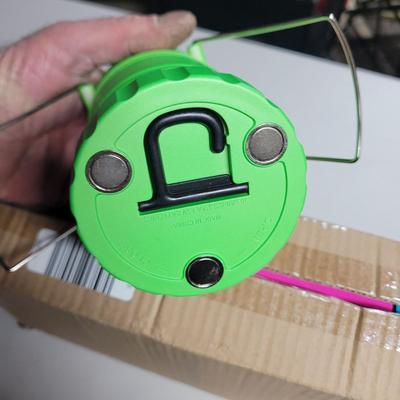 Sale Photo Thumbnail #287: Battery powered, uses rechargeable or conventional AA batteries. Magnetic bottom with a hook or carry with handle