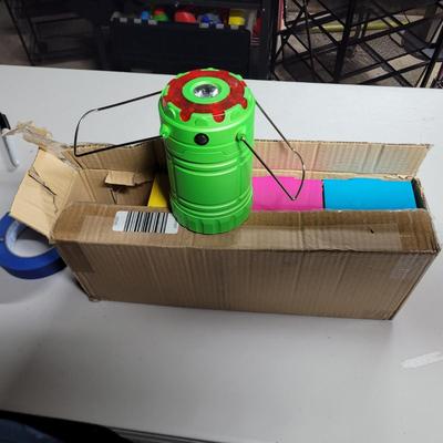 Sale Photo Thumbnail #286: Battery powered, uses rechargeable or conventional AA batteries. Magnetic bottom with a hook or carry with handle