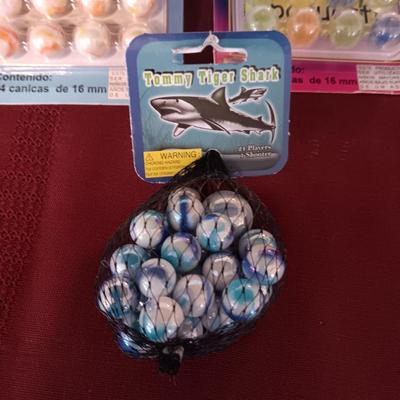 UNOPENED PACKAGES OF MARBLES