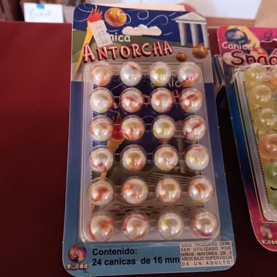 UNOPENED PACKAGES OF MARBLES