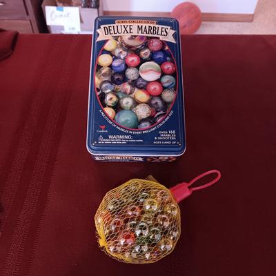 UNOPENED PACKAGES OF MARBLES
