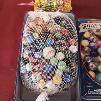 UNOPENED PACKAGES OF MARBLES