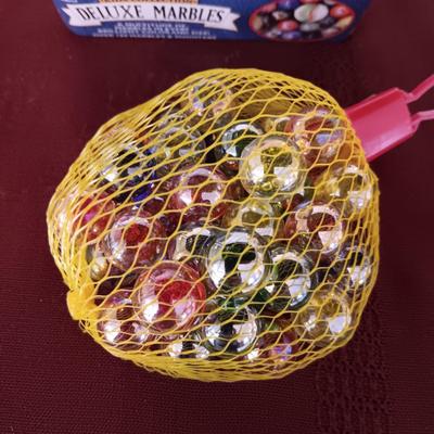UNOPENED PACKAGES OF MARBLES