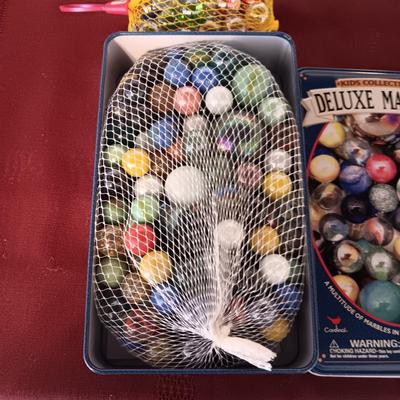 UNOPENED PACKAGES OF MARBLES