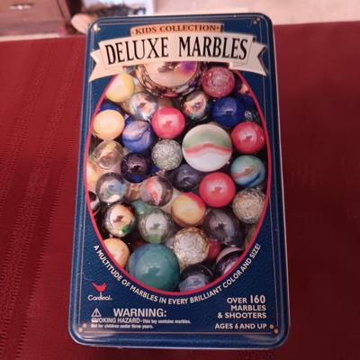 UNOPENED PACKAGES OF MARBLES