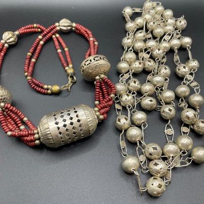 Very unique silver tone necklaces