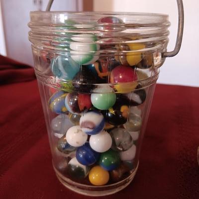 2 PINT SIZE JARS OF MARBLES