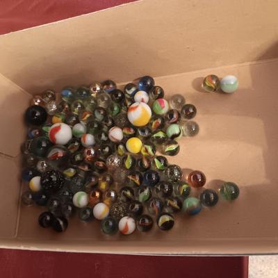 2 PINT SIZE JARS OF MARBLES