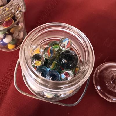 2 PINT SIZE JARS OF MARBLES