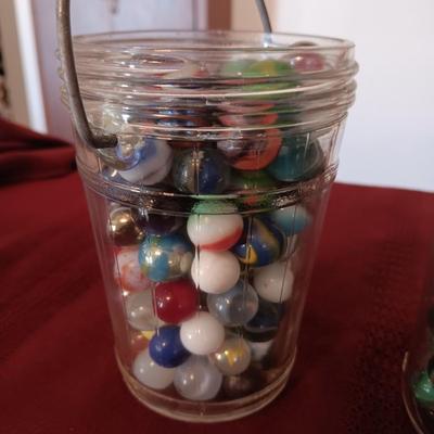 2 PINT SIZE JARS OF MARBLES