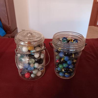 2 PINT SIZE JARS OF MARBLES